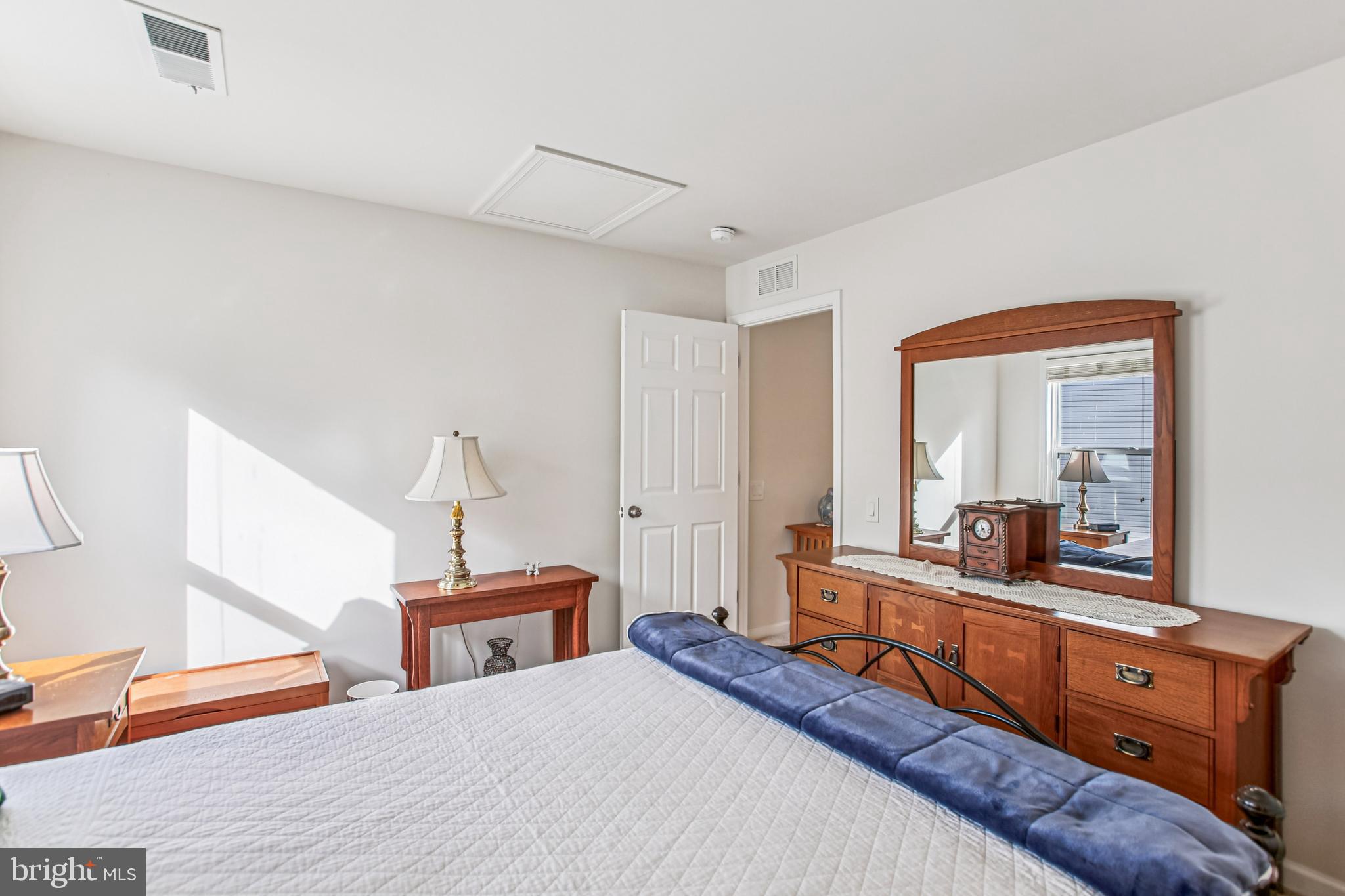 187 Denison Street Fredericksburg, VA 22406 - Photo 25 of 40 a bedroom with a bed and wooden floor