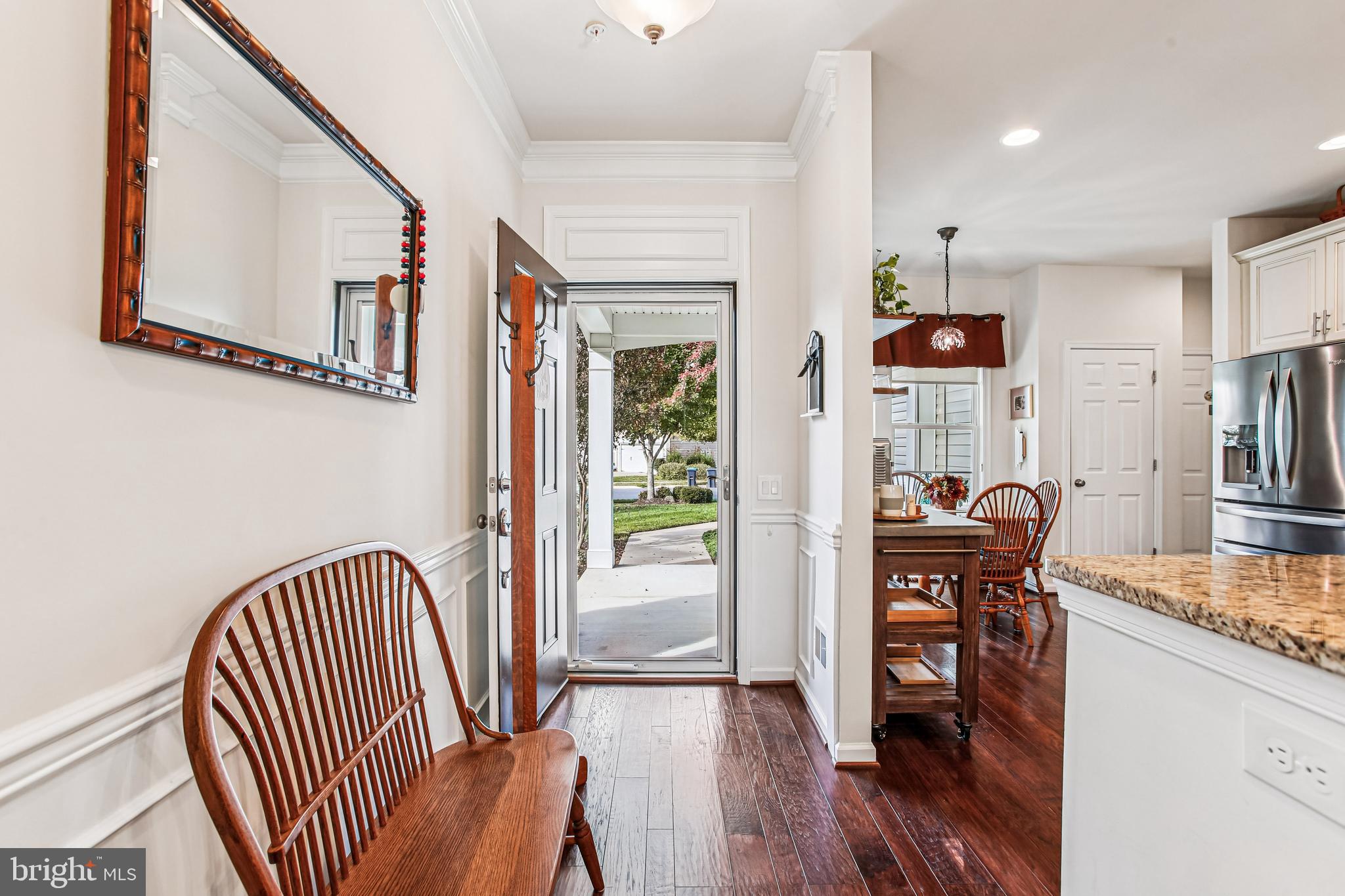 187 Denison Street Fredericksburg, VA 22406 - Photo 6 of 40 a view of a hallway with furniture and wooden floor