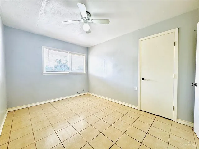 a bathroom with a sink toilet and a mirror