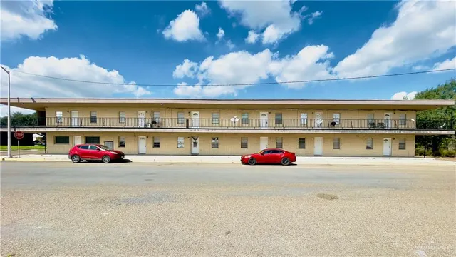 a view of a building with a street