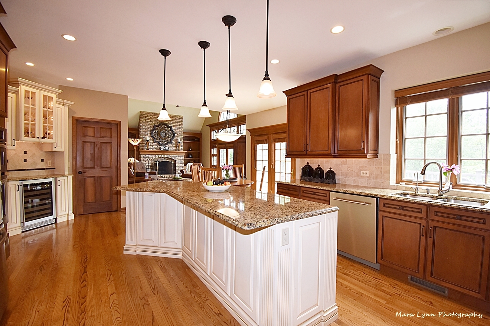 1649 Eagle Brook Drive Geneva, IL 60134 - Photo 4 of 11 a kitchen with stainless steel appliances granite countertop sink stove and refrigerator