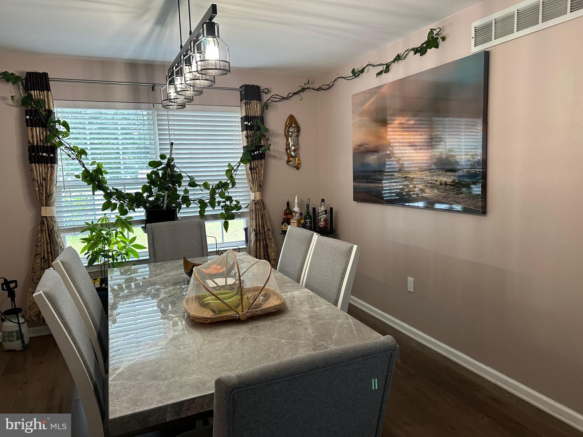 12 Murray Way Blackwood, NJ 08012 - Photo 25 of 46 a view of a dining room with furniture and wooden floor