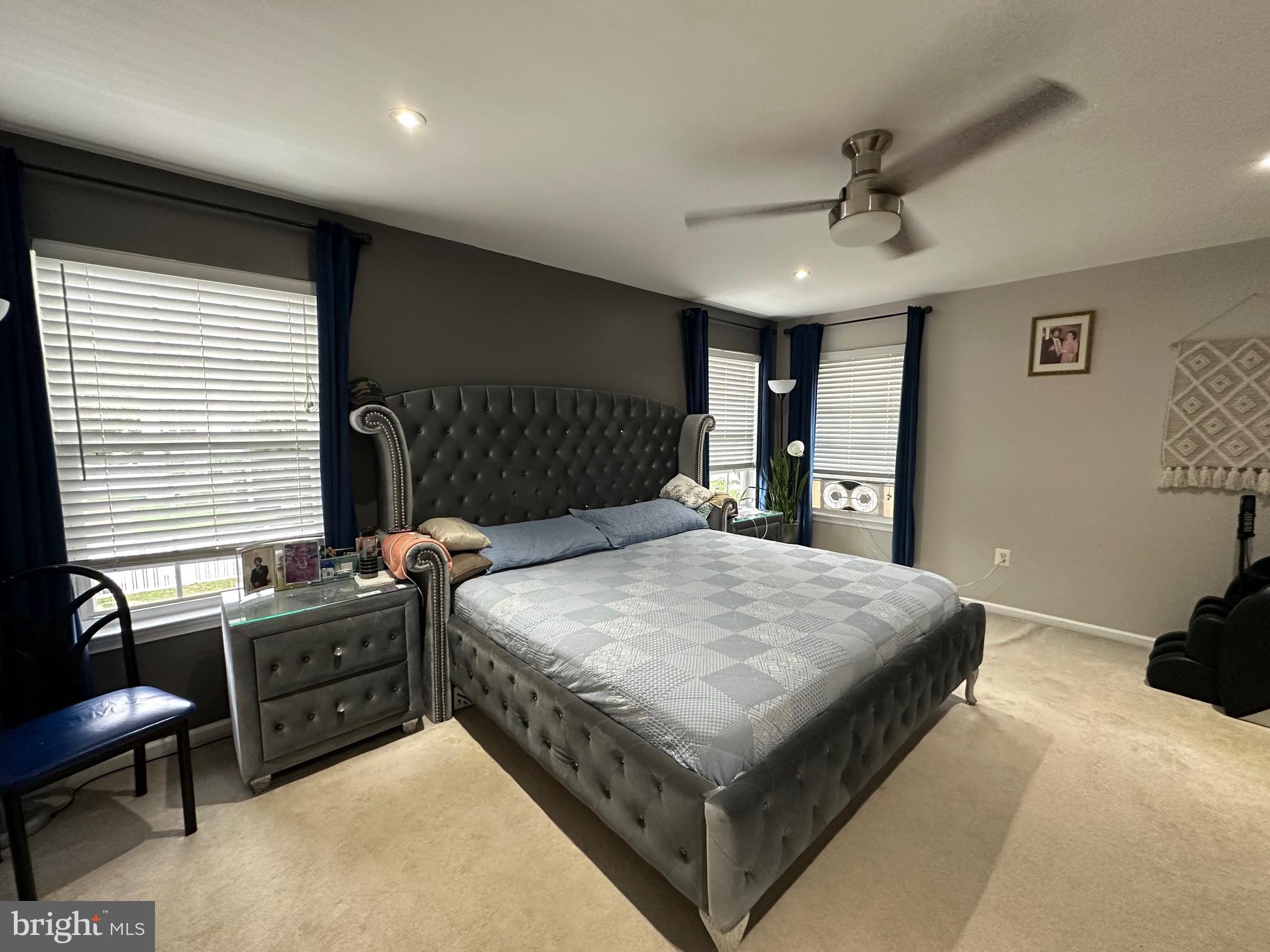 12 Murray Way Blackwood, NJ 08012 - Photo 28 of 46 a bedroom with a large bed and a chandelier