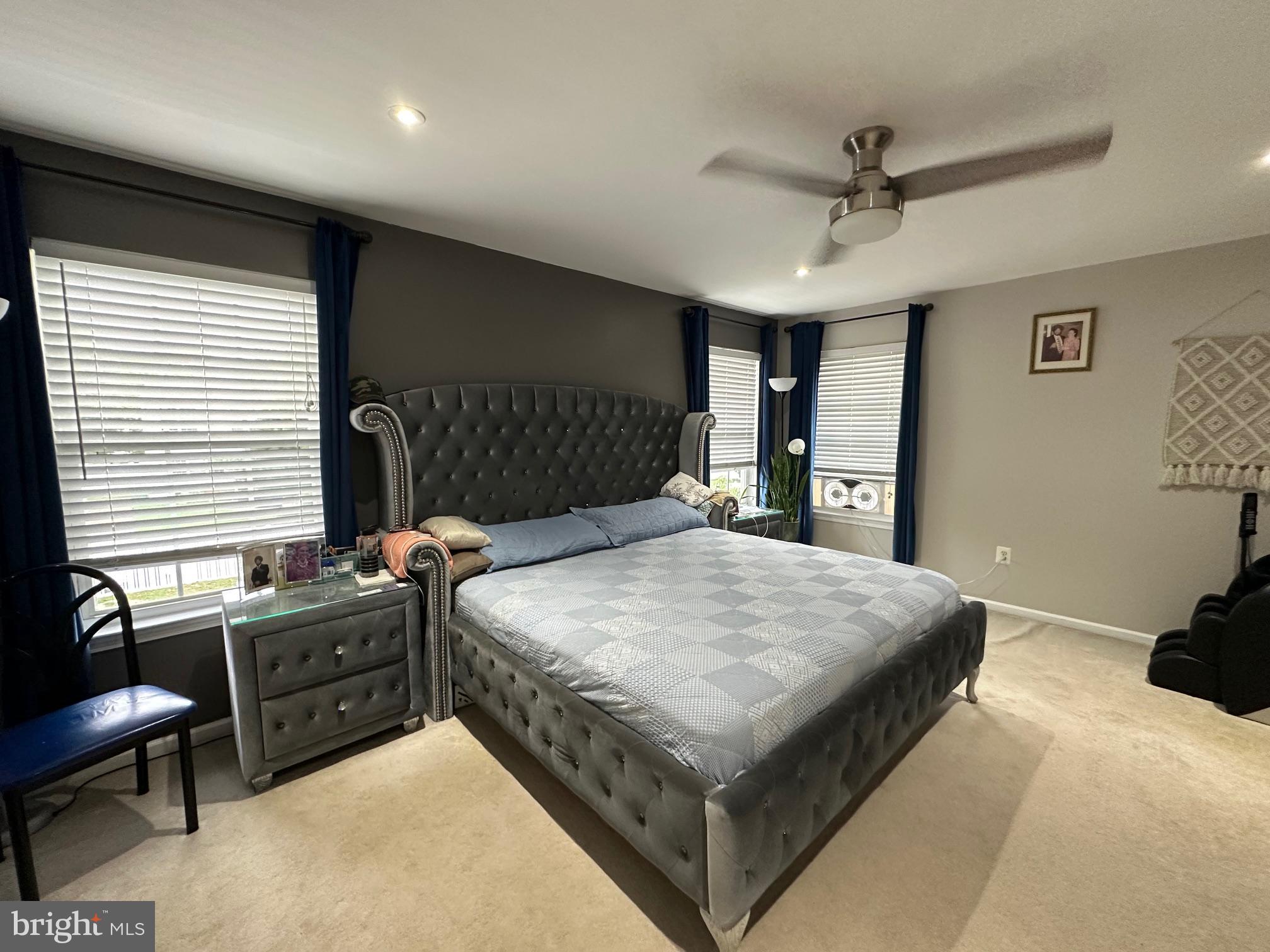 12 Murray Way Blackwood, NJ 08012 - Photo 29 of 46 a bedroom with a large bed and a chandelier