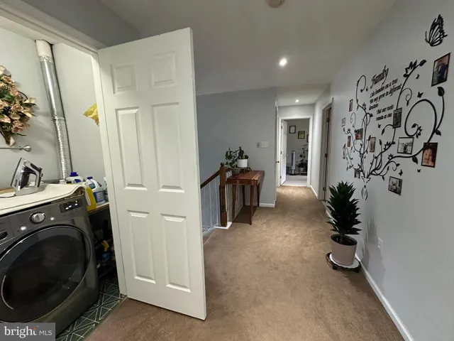 a view of entryway with livingroom and furniture