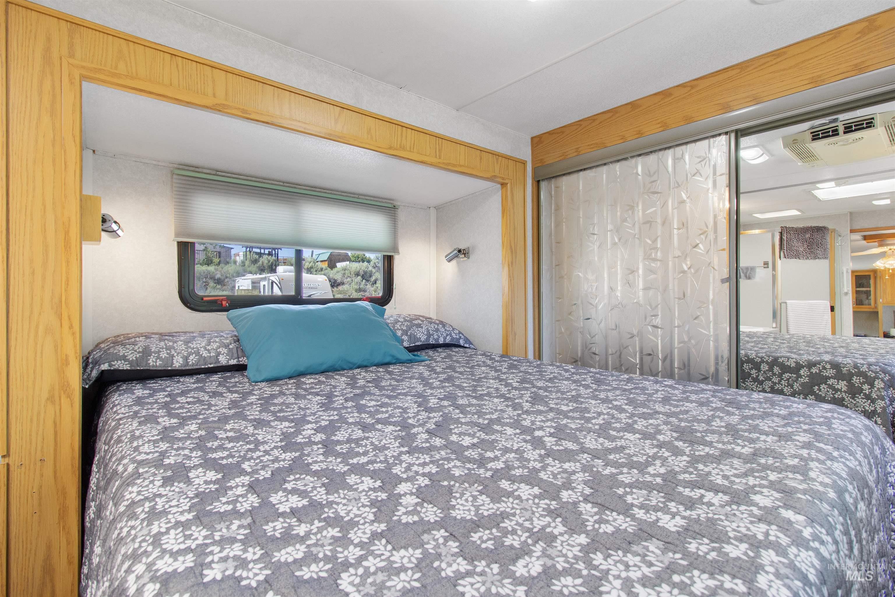 106 West Magic Road Shoshone, ID 83352 - Photo 25 of 45 Built-in bed frame with overhead storage and recessed lighting