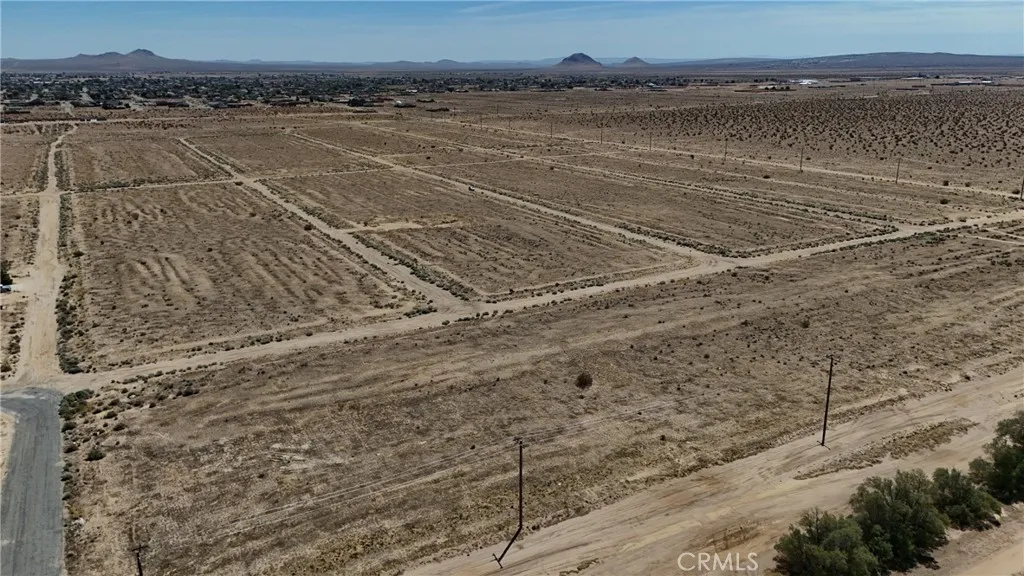 742 71st Street Edwards, CA 93523 - Photo 6 of 8 Red boundary lines on pictures are an estimate and for marketing purposes only. Buyer to verify all aspects of this property including, but not limited to utilities, assessments, boundaries, usage, access, and zoning to satisfy themselves.