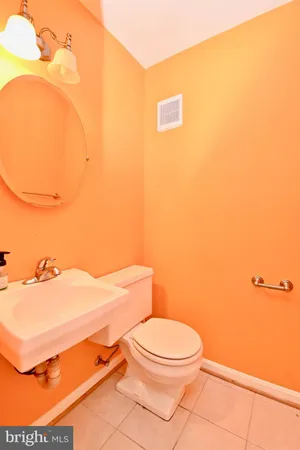 a bathroom with a toilet and a sink