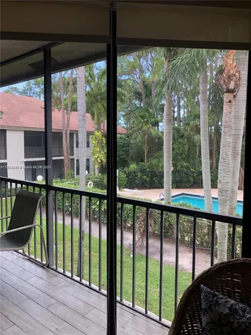 a view of a street from a balcony