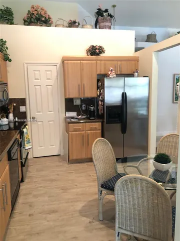 a view of a bathroom from the hallway