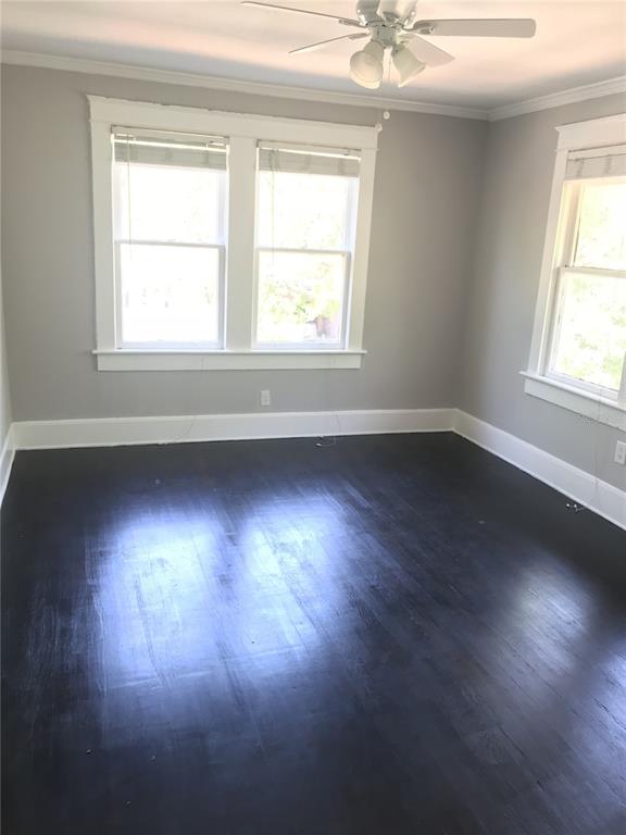 1952 Morrill Street, Unit B Sarasota, FL 34236 - Photo 7 of 12 wooden floor in an empty room with a window