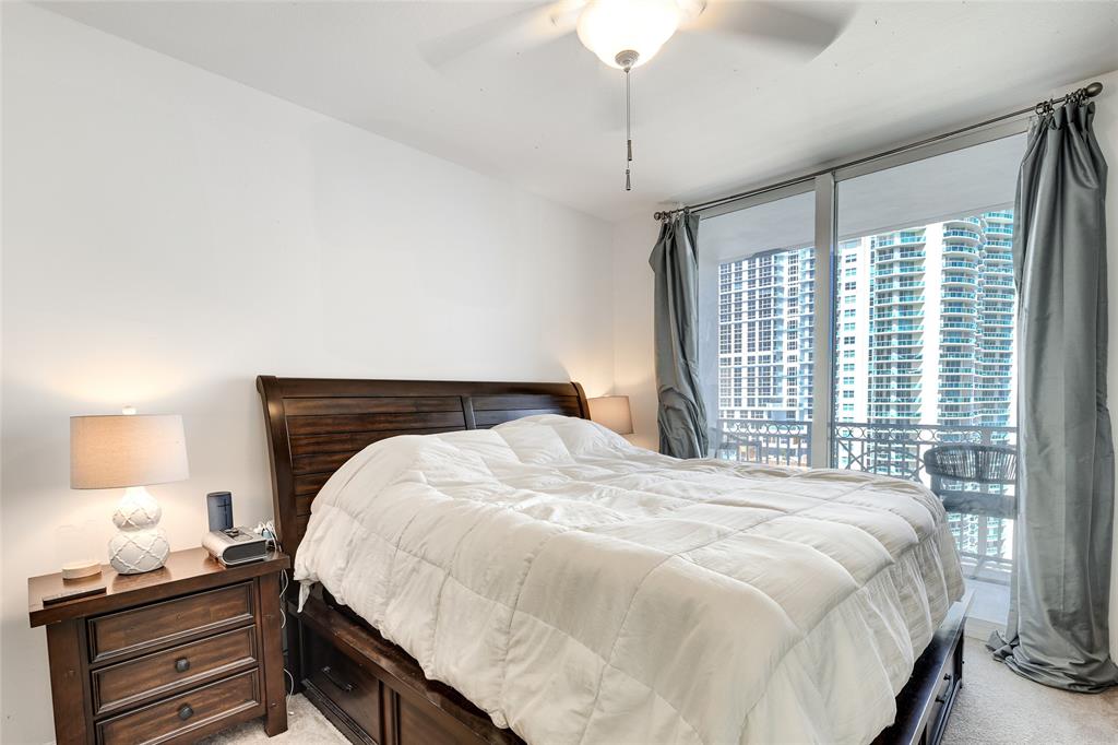 511 Southeast 5th Avenue, Unit 1602 Fort Lauderdale, FL 33301 - Photo 12 of 66 a bedroom with a bed and wooden floor