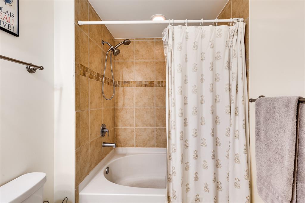 511 Southeast 5th Avenue, Unit 1602 Fort Lauderdale, FL 33301 - Photo 14 of 66 a bathroom with a shower curtain and a sink