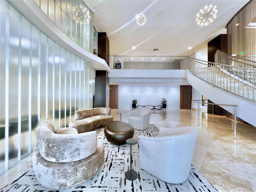 511 Southeast 5th Avenue, Unit 1602 Fort Lauderdale, FL 33301 - Photo 25 of 66 a living room with furniture and a chandelier