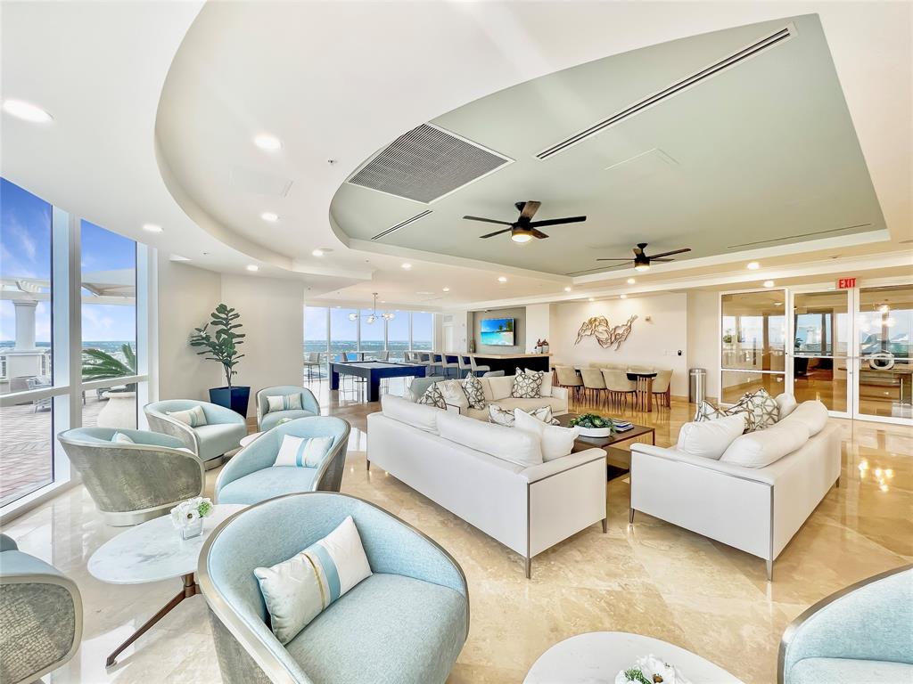 511 Southeast 5th Avenue, Unit 1602 Fort Lauderdale, FL 33301 - Photo 53 of 66 a living room with furniture and a large window