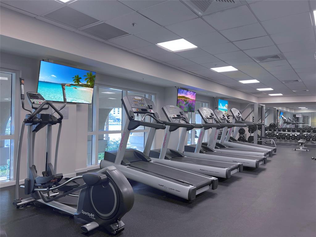 511 Southeast 5th Avenue, Unit 1602 Fort Lauderdale, FL 33301 - Photo 61 of 66 a view of a room with gym equipment