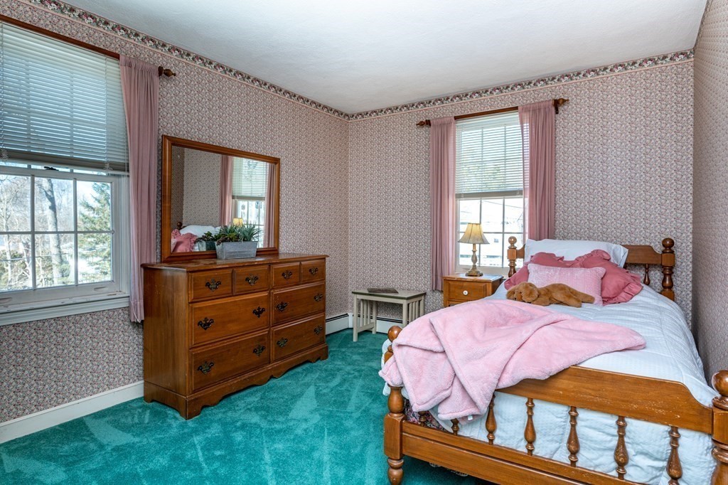 113 Gayland Road Needham, MA 02492 - Photo 15 of 32 a bedroom with a bed and windows