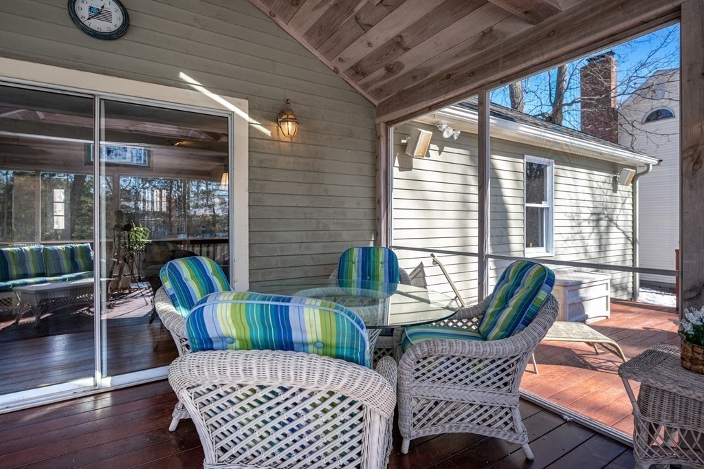 113 Gayland Road Needham, MA 02492 - Photo 20 of 32 a view of a dining room with furniture wooden floor and windows
