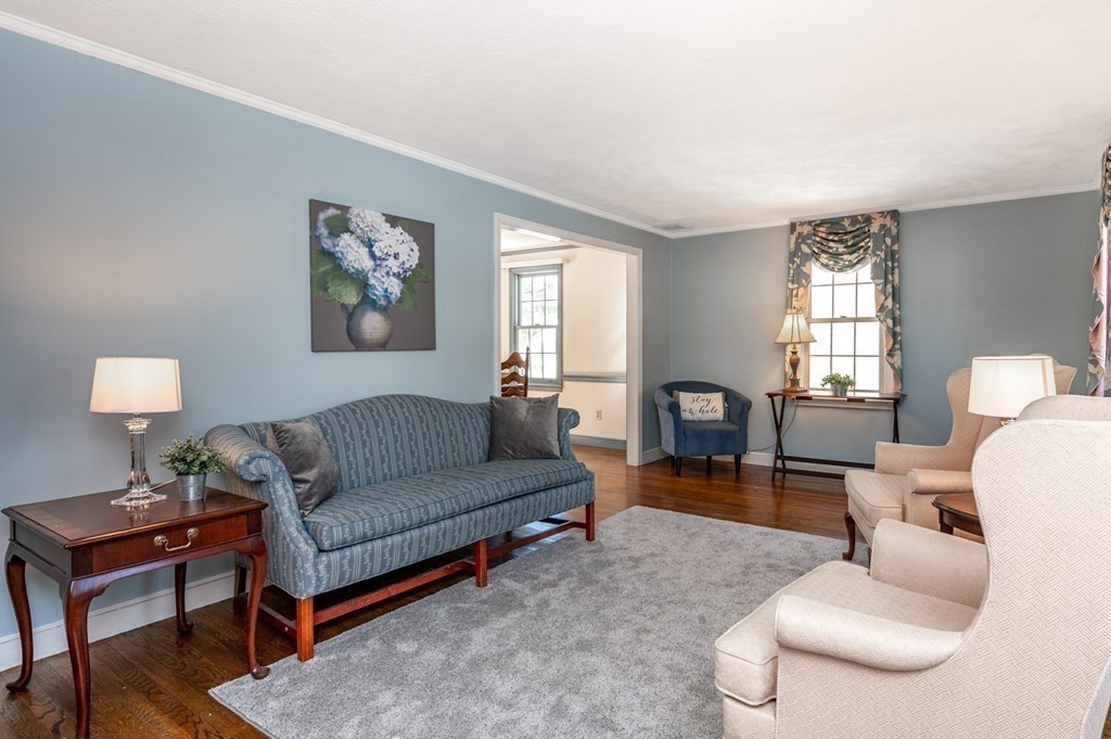 113 Gayland Road Needham, MA 02492 - Photo 2 of 32 a living room with furniture a lamp and a window