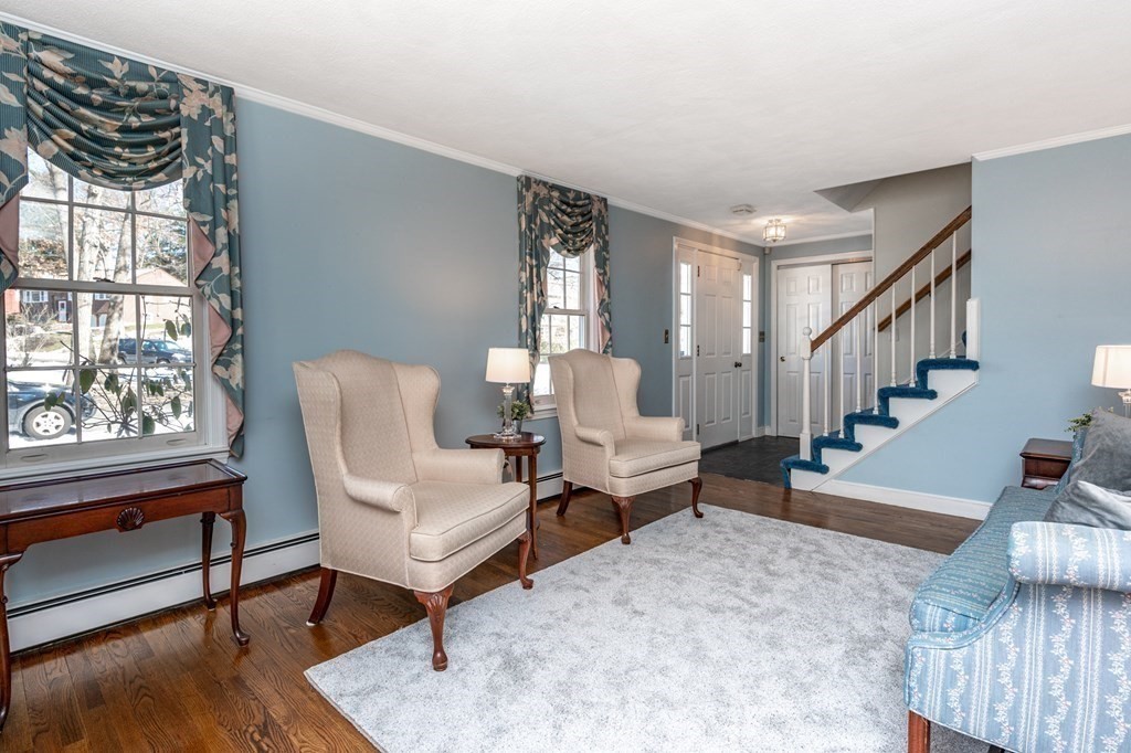 113 Gayland Road Needham, MA 02492 - Photo 3 of 32 a living room with furniture a rug and a window