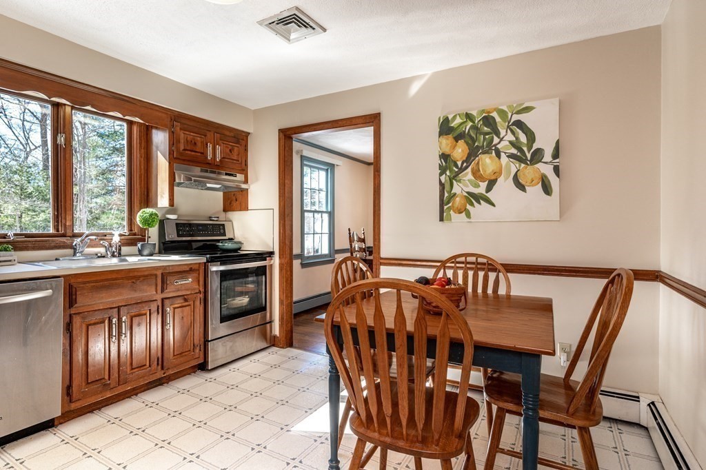 113 Gayland Road Needham, MA 02492 - Photo 7 of 32 a view of a dining room with furniture window and outside view