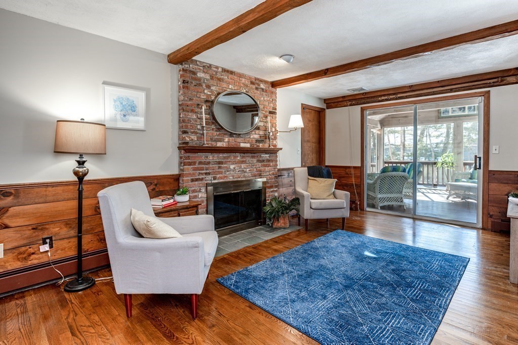113 Gayland Road Needham, MA 02492 - Photo 9 of 32 a living room with fireplace furniture and a rug