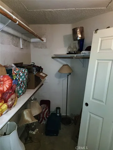 a kitchen with a stove and a refrigerator