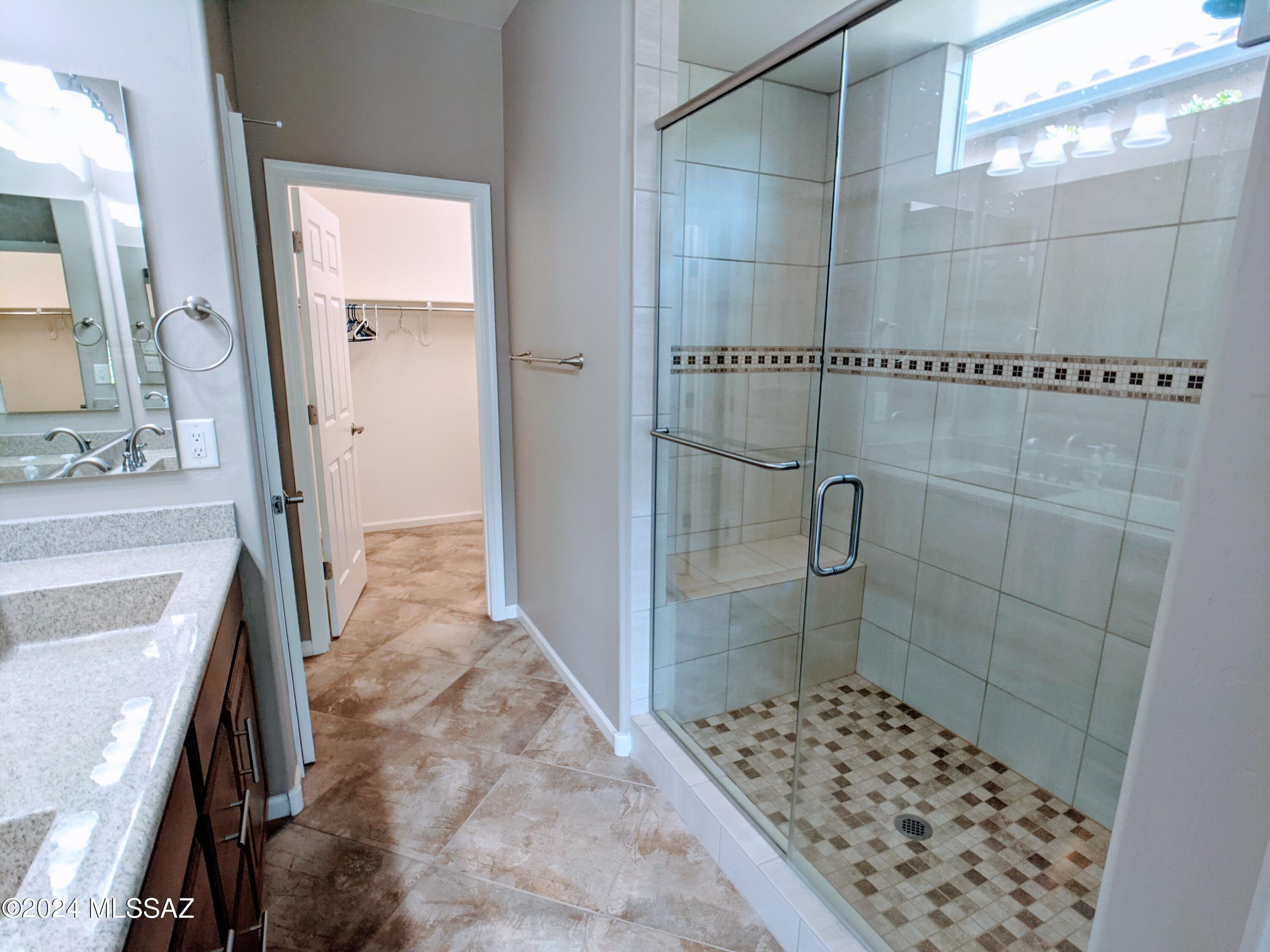 61021 East Slate Road Oracle, AZ 85623 - Photo 15 of 18 a bathroom with a sink a toilet and shower