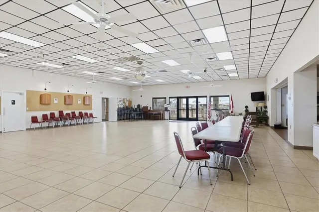 a view of a swimming pool with a patio