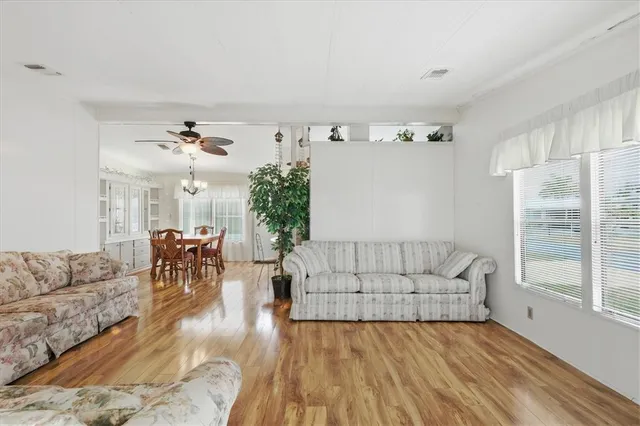 a living room with furniture and a table