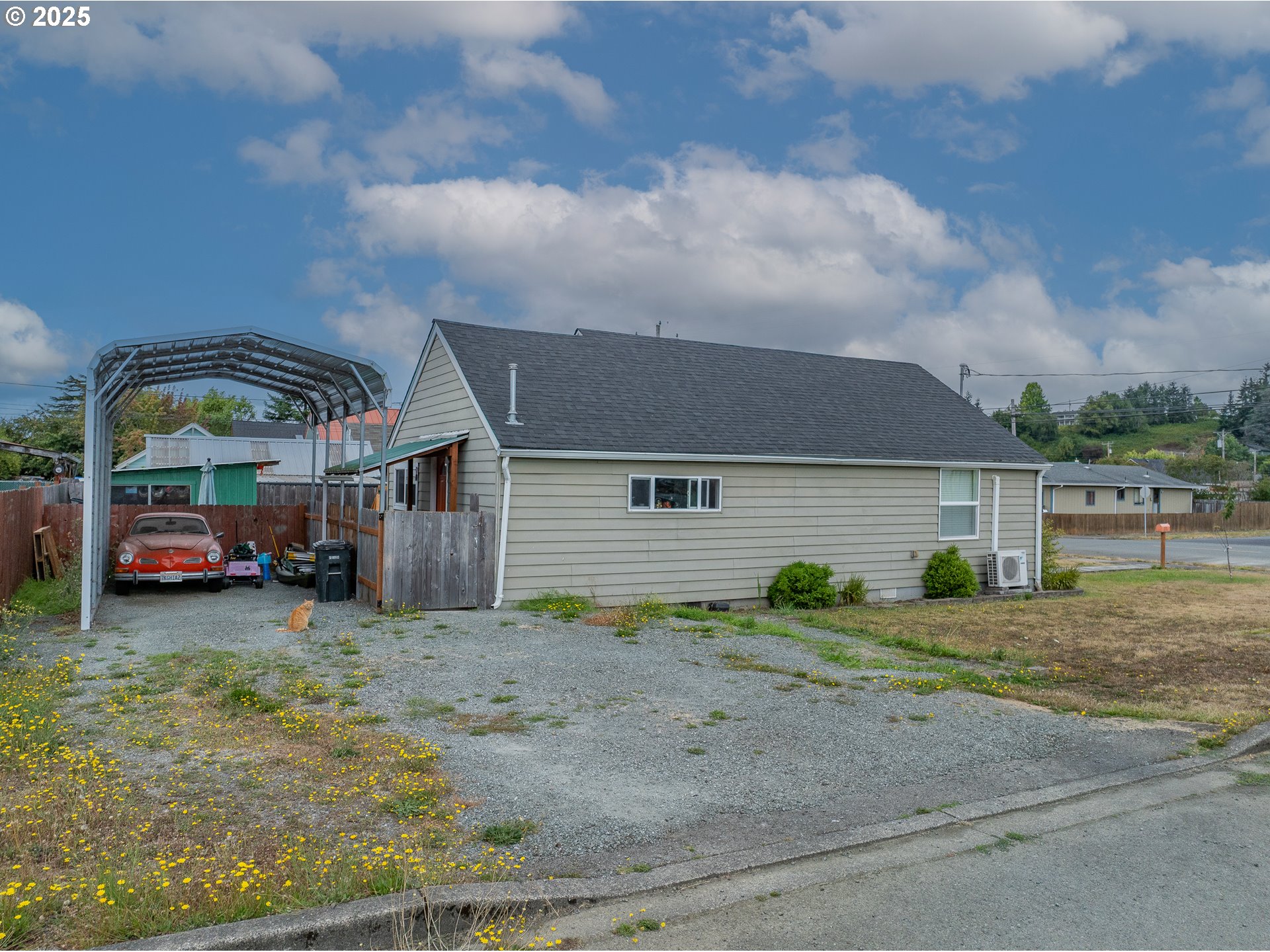 a view of car parked in front of house