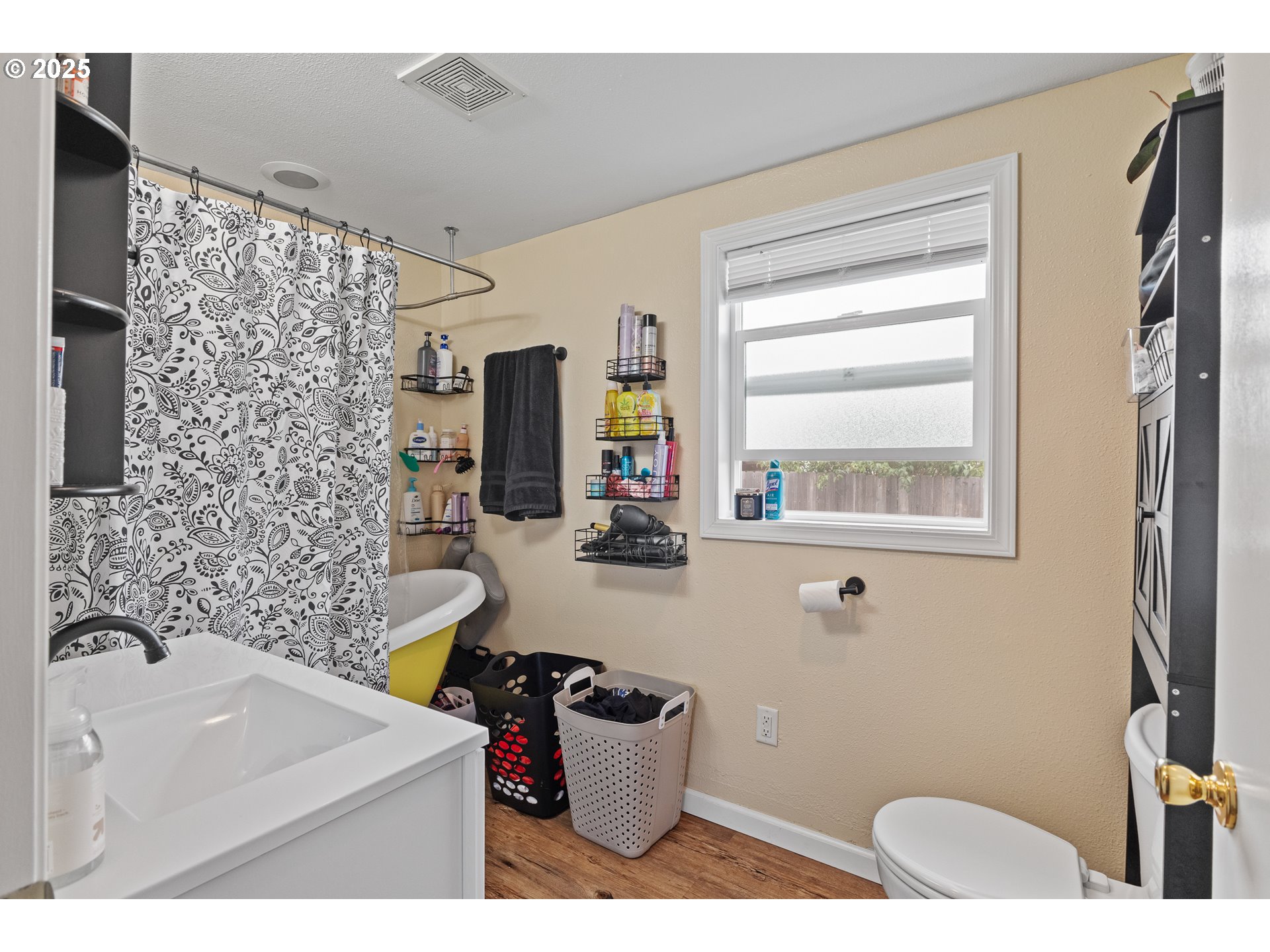 1434 Maryland Avenue Myrtle Point, OR 97458 - Photo 11 of 24 a bathroom with a sink toilet and window