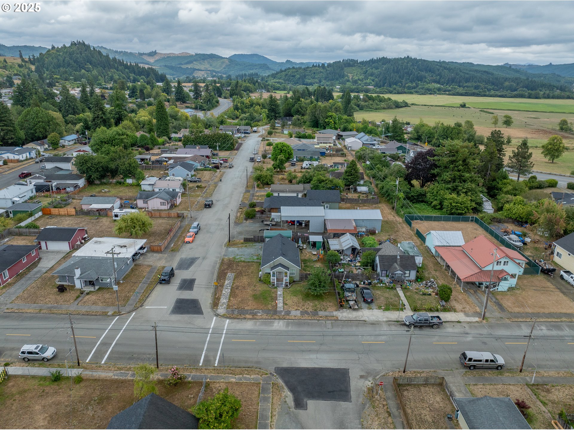 1434 Maryland Avenue Myrtle Point, OR 97458 - Photo 23 of 24 an aerial view of residential houses with outdoor space