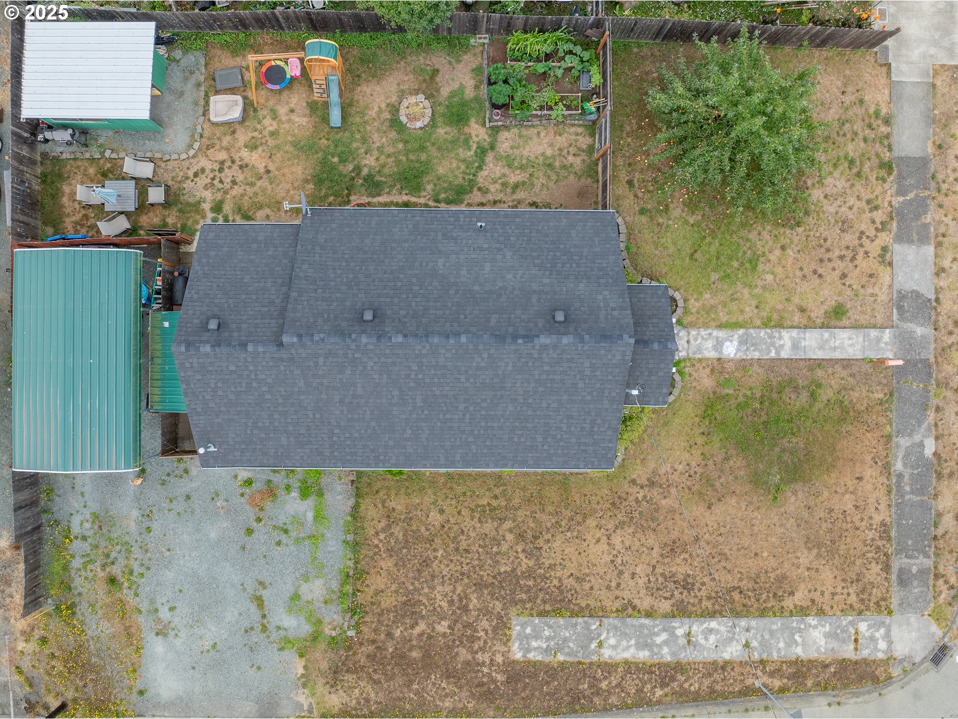 1434 Maryland Avenue Myrtle Point, OR 97458 - Photo 24 of 24 an aerial view of a house with a yard