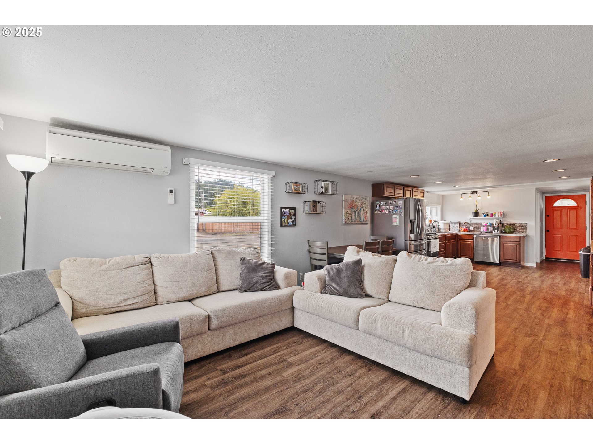 1434 Maryland Avenue Myrtle Point, OR 97458 - Photo 5 of 24 a living room with furniture and a couch