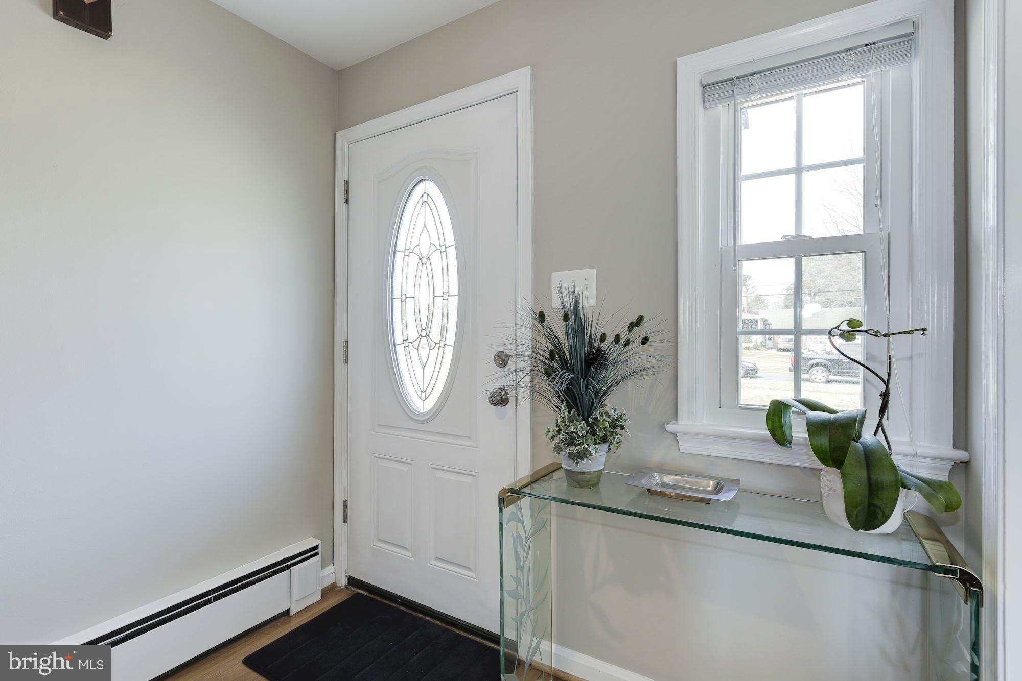 1710 Gayfields Drive Silver Spring, MD 20906 - Photo 8 of 65 Large, open and bright foyer entry w/hardwood flrs
