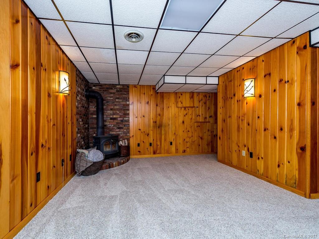 107 Old Distillery Road Hendersonville, NC 28739 - Photo 18 of 24 a view of an empty room with a window