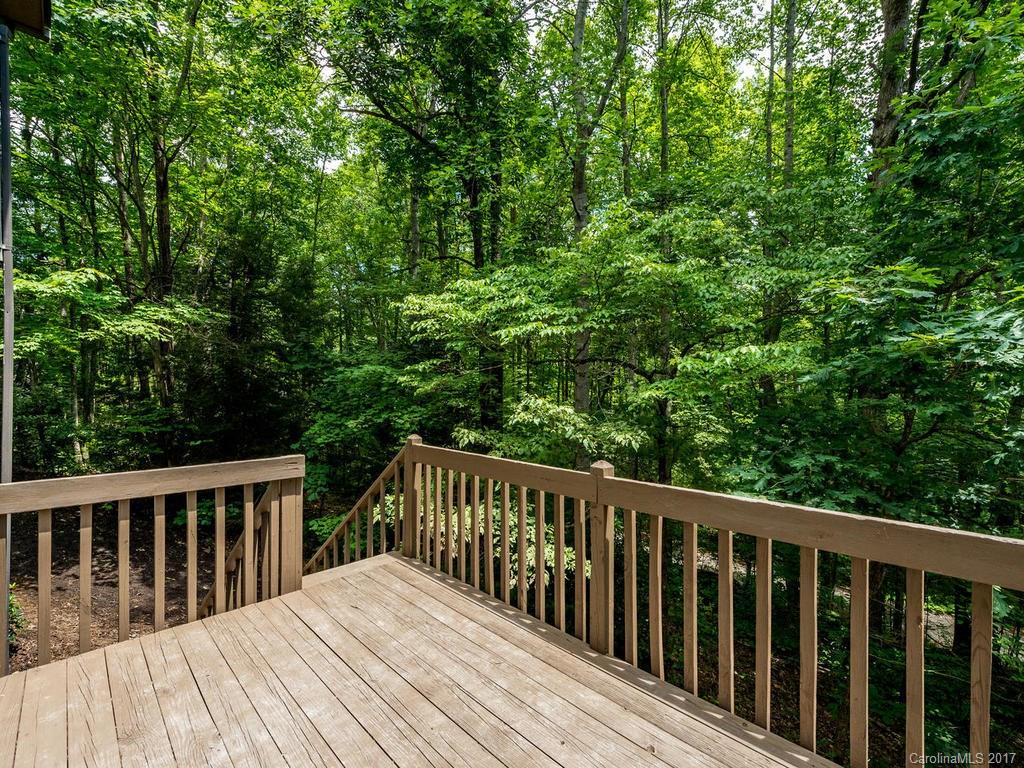 107 Old Distillery Road Hendersonville, NC 28739 - Photo 24 of 24 a balcony with wooden floor and fence