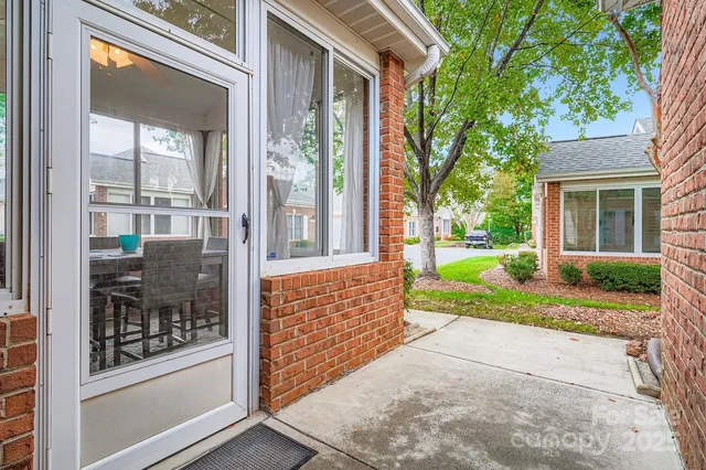 a view of a porch with a yard