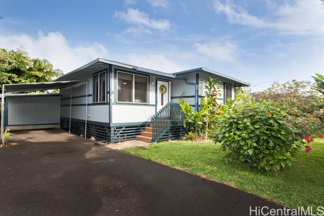 66-341 Kaamooloa Road, Unit E Waialua, HI 96791 - Photo 1 of 1 a front view of a house with a yard