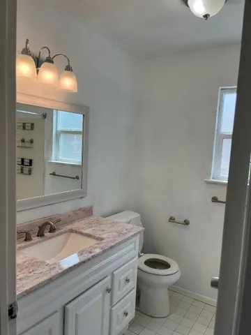 a view of a room with a fan