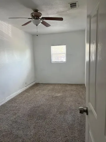 an empty room with closet