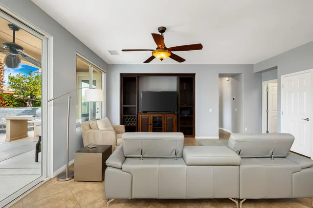 a bathroom with a double vanity sink mirror and shower