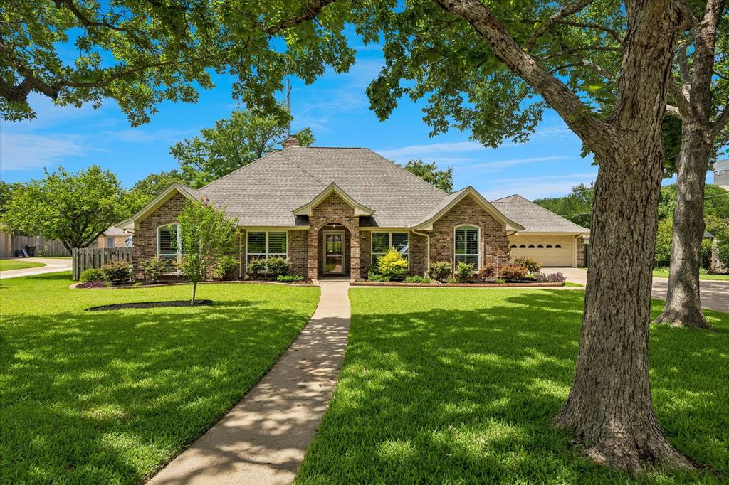404 Moonlight Lane Keller, TX 76248 - Photo 1 of 40 a front view of a house with yard and green space