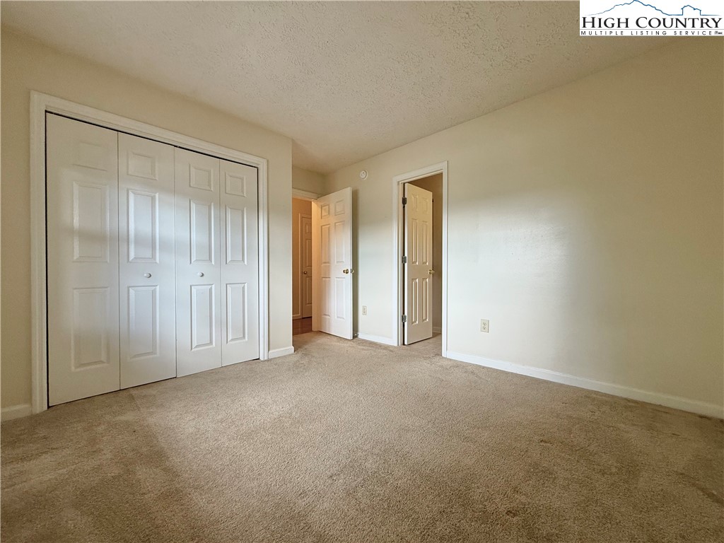 800 Meadowview Drive, Unit 17 Boone, NC 28607 - Photo 20 of 26 a view of an empty room with closet area