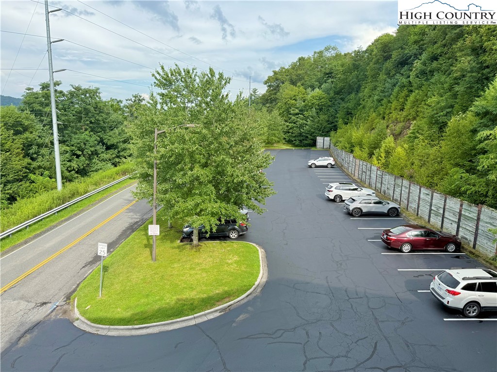 800 Meadowview Drive, Unit 17 Boone, NC 28607 - Photo 6 of 26 a view of a swimming pool with a yard