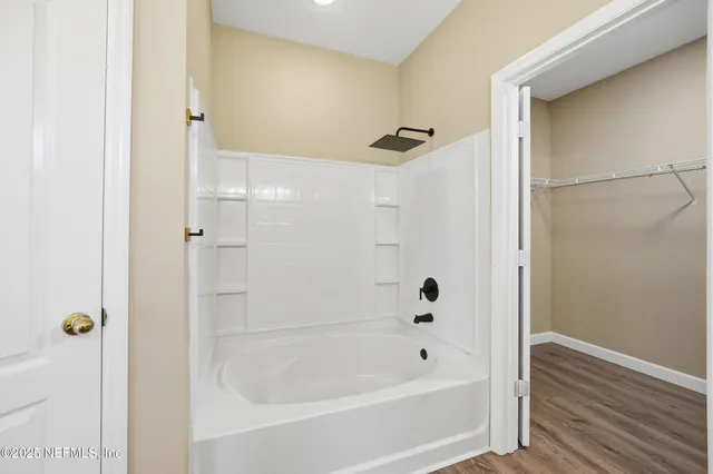 a bathroom with a bathtub