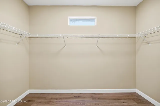 a view of a room with racks on the wall