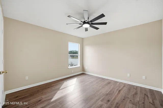 a bathroom with a sink a vanity and a mirror