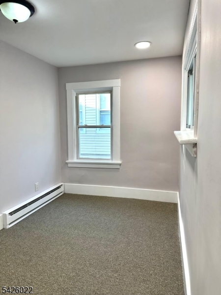 82 Mission Street Montclair, NJ 07042 - Photo 5 of 8 an empty room with windows